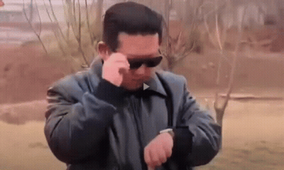 Man In Sunglasses Looking At Watch GIF