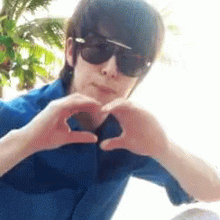 Man In Sunglasses Making Heart With Hands GIF