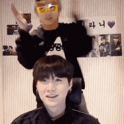Man In Sunglasses Next To Boy In Black Jacket GIF