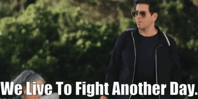 Man In Sunglasses Next To Woman We Live To Fight Another Day GIF