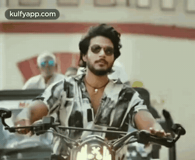 Man In Sunglasses Riding Motorcycle GIF