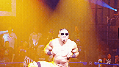Man In Sunglasses Running In Wrestling Ring GIF