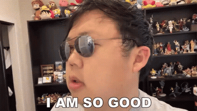 Man In Sunglasses Saying I Am So Good In Front Of Figurine Shelf GIF