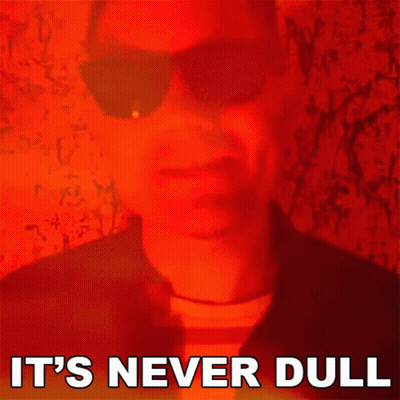 Man In Sunglasses Saying It's Never Dull GIF