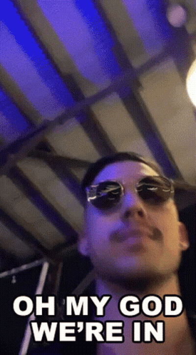 Man In Sunglasses Saying Oh My God We're In GIF