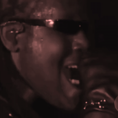 Man In Sunglasses Singing Into Microphone GIF