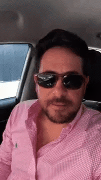 Man In Sunglasses Sitting In Back Seat Of Car GIF