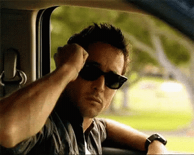 Man In Sunglasses Sitting In Car GIF