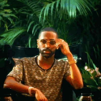 Man In Sunglasses Sitting In Chair GIF