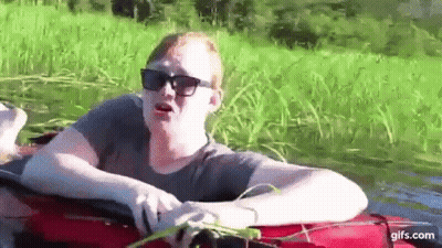 Man In Sunglasses Sitting On Red Raft GIF