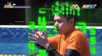 Man In Sunglasses Smiling In Front Of Running Man Ad GIF