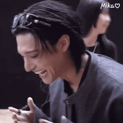 Man In Sunglasses Smiling Saying Mika GIF