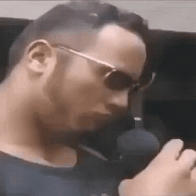 Man In Sunglasses Smoking Cigarette GIF