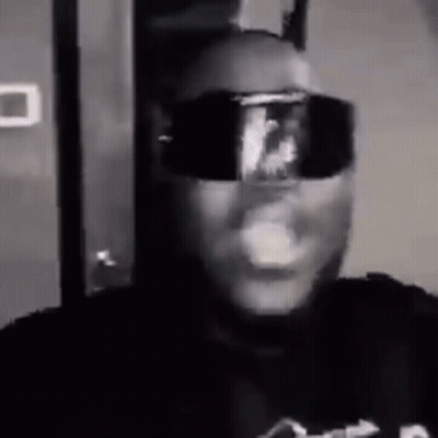 Man In Sunglasses Smoking Cigarette GIF