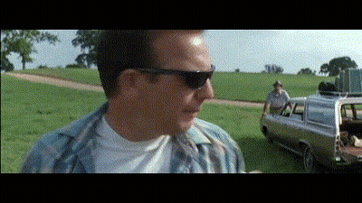 Man In Sunglasses Standing By Car In Field GIF