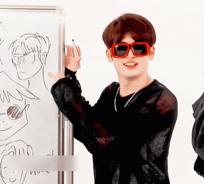 Man In Sunglasses Standing In Front Of Whiteboard GIF