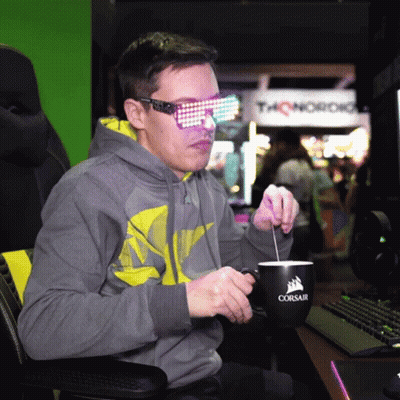Man In Sunglasses Stirring Coffee From Corsair Mug GIF