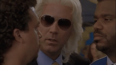 Man In Sunglasses Talking To Another Man GIF