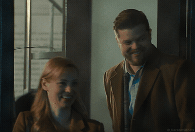 Man In Sunglasses Talking To Woman GIF