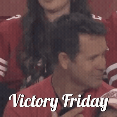 Man In Sunglasses Thumbs Up At Football Game GIF