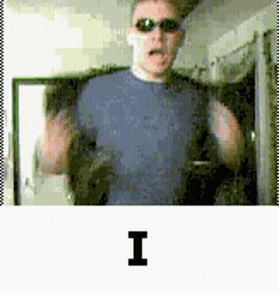 Man In Sunglasses With Letter I On Shirt GIF
