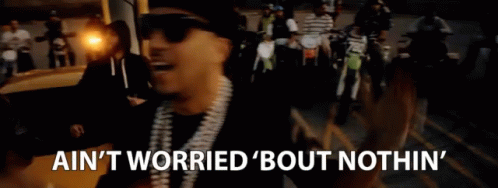 Man In Sunglasses With Motorcycle Crowd Saying Ain't Worried Bout Nothin GIF