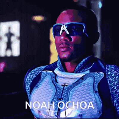Man In Sunglasses With Noah Ochoa On Chest GIF