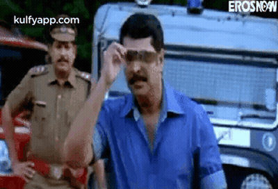 Man In Sunglasses With Police Car And Officer GIF