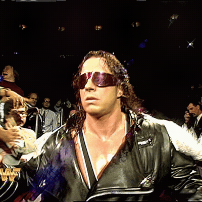 Man In Sunglasses With W Shirt In Front Of Crowd GIF
