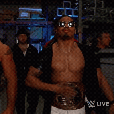 Man In Sunglasses With WWE Live Belt GIF