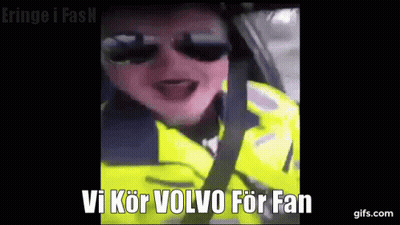 Man In Sunglasses Yellow Jacket Driving Says Vi Kör Volvo For Fan GIF