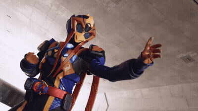 Man In Superhero Costume Arms Outstretched GIF