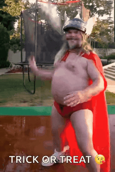 Man In Superhero Costume Dancing Trick Or Treat GIF