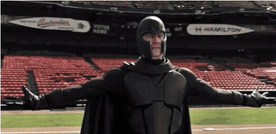 Man In Superhero Costume In Front Of Hamilton Ad GIF