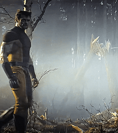 Man In Superhero Costume In Woods GIF