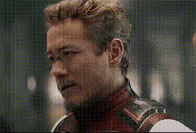 Man In Superhero Costume Looking GIF
