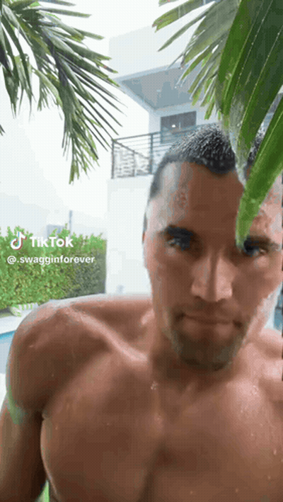 Man In Superhero Costume Making Face GIF