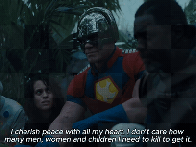 Man In Superhero Costume Talking To Group GIF