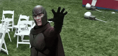 Man In Superhero Costume Waving GIF