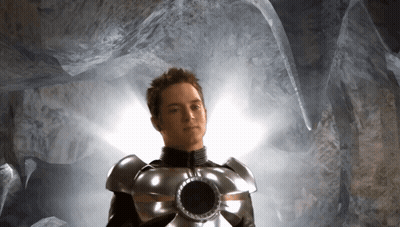 Man In Superhero Costume With Hole In Middle GIF
