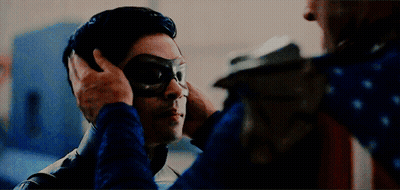 Man In Superhero Costume With Mask GIF