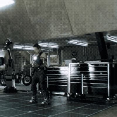 Man In Superhero Costume With Motorcycle Sign GIF
