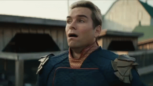 Man In Superhero Costume With Mouth Open GIF