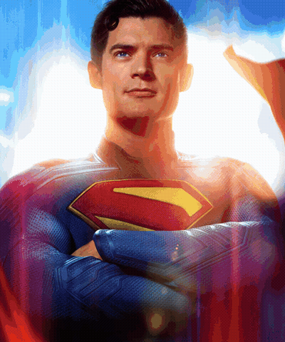 Man In Superman Costume Arms Crossed Looking At Camera GIF