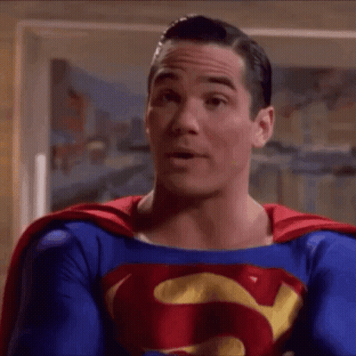 Man In Superman Costume Close Up GIF