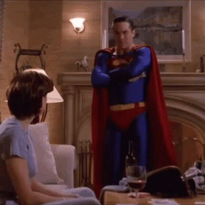 Man In Superman Costume Close Up GIF