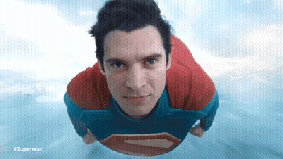 Man In Superman Costume Flying GIF