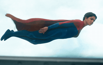 Man In Superman Costume Flying GIF