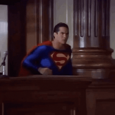 Man In Superman Costume In Courtroom GIF