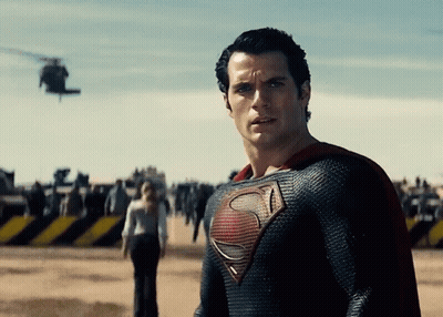 Man In Superman Costume In Desert GIF